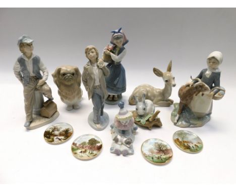 A collection of Lladro figures to include Pekinese dog, deer, rabbit, clown and female figurine, along with two Nao figures, 