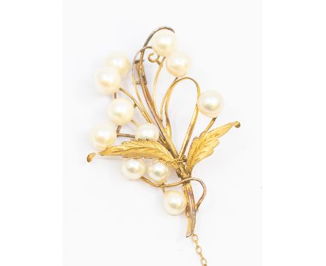 A vintage pearl set 14ct gold spray brooch, comprising cultured pearl accents, length approx 58mm, pin and trombone clasp, ma