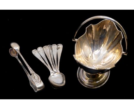 A collection of silver to include; a George V silver oval footed salt basin, swing handle, hallmarked by Barker Brothers, Bir