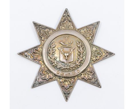 A Victorian silver Ancient Order of Foresters sash badge, having foliage and wreath relief design with central Stag's head an