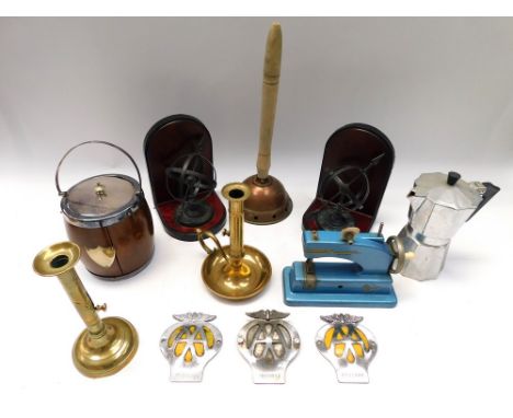 A collection of mixed metal wares and other items to include, copper and brass wares, novelty arrow sun dial like bookends. A