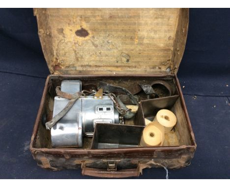 Railwayana Interest: A cased TIM Ltd (Ticket Issue Machines Limited) train/tram/bus ticket machine, stamped H69, with leather