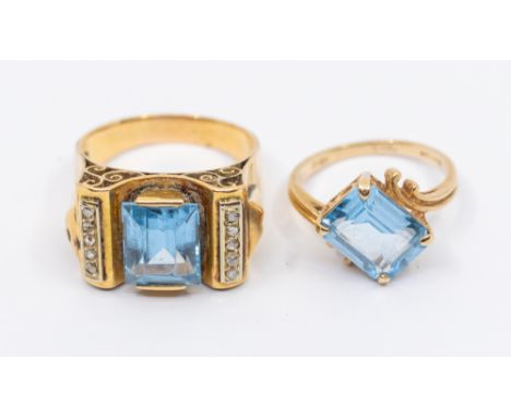 Two stone set gold dress rings, to include a retro ring set to the centre with a rectangular synthetic spinel, within two dia