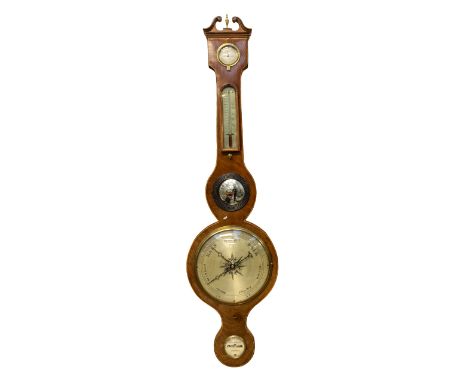 A late 19th/early 20th century veneered oak barometer, with mirrored centre.