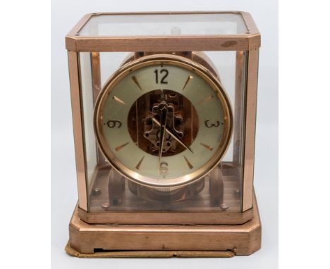 Mid 20th century atmospheric mantle clock in glazed case.
