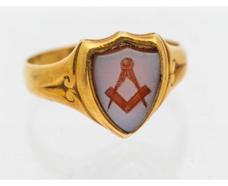 Masonic Interest- a gentleman's gold hard stone signet ring, comprising a shield shaped cartouche inset with a agate hard sto