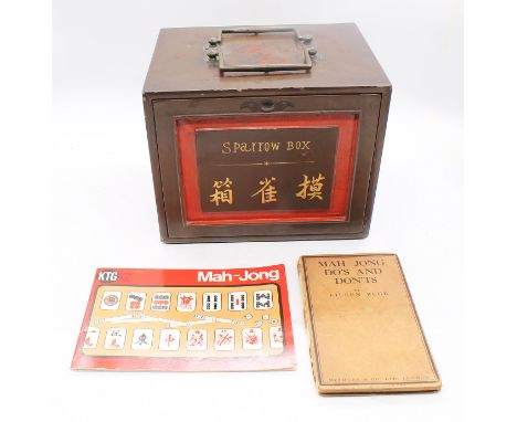 An early 20th century, most likely 1920s Mahjong set, being encased in a metal container with title "Sparrow Box" and Chinese