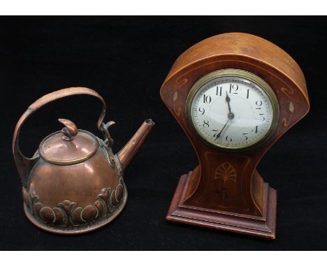 An early 20th century balloon shaped mahogany cased mantle clock with inlayed detail, along with an early 20th century copper