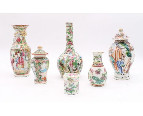 A collection of Chinese export famille rose porcelain vases and pots, c.1860, with rose medallion detail