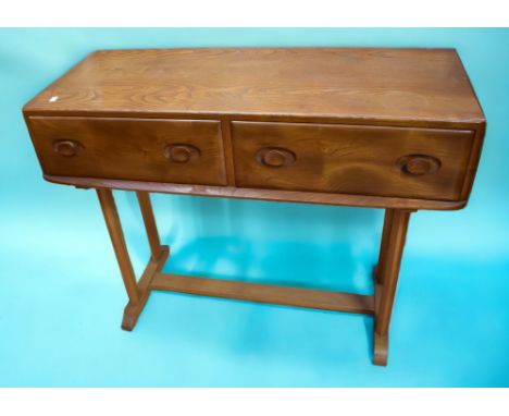 A late 20th century Ercol two drawer cutlery and place mat kitchen/dining unit, light oak, 108cm x 82cm.