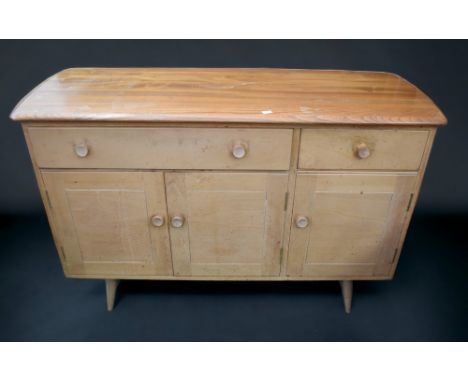 A collection of&nbsp; late 20th Century retro furniture to include, a glazed two shelf cabinet, a small Ercol sideboard, two 