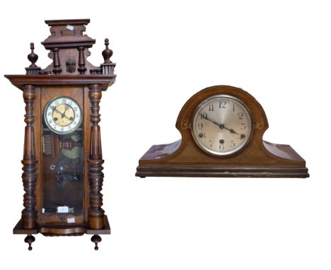 Late 19th century mahogany 8 day german wall clock along with a 1920s Napoleon hat mantle clock.
