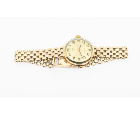 A ladies 9ct gold Rotary wristwatch, comprising a gilt dial with applied Arabic indices, case approx 20mm, manual wind, to a 