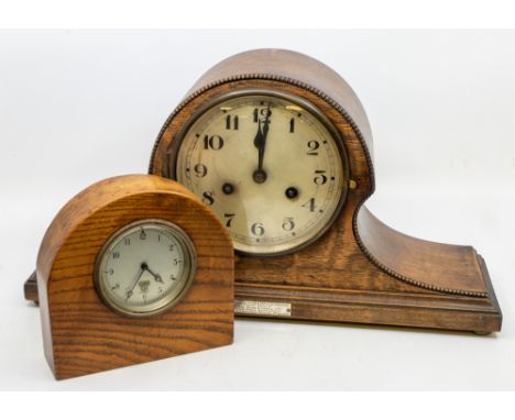 An early 20th century (1920s) large mantle clock, wooden cased. Along with a small oak cased Smiths of London mantle clock. (