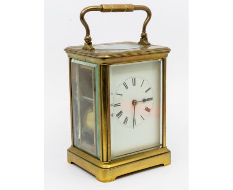 Late 19th century French brass chiming mantle clock. Two barrel movement, glazed sides and top with key.&nbsp;