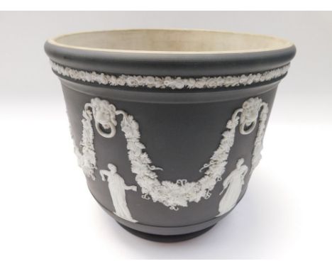 A 19th century Wedgewood Black Jasper basalt planter/jardini&egrave;re. Factory impressed mark to base.