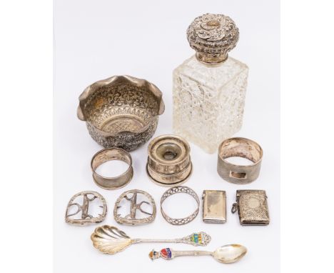 A collection of silver items to include; an early 20th century silver topped square cut glass perfume bottle, the silver havi