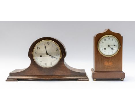 Edwardian 8 day mahogany mantle clock with Arabic numerals and bat wing detail. Also a 1930's 8 day mantle clock.