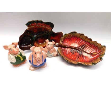 Two 1970s Poole style table dishes along with three Wade Natwest pigs.