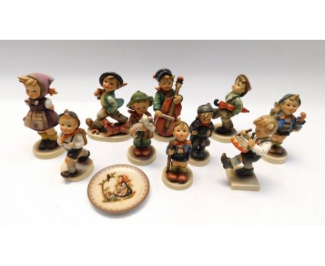 Goebel - A collection of Hummel figurines.