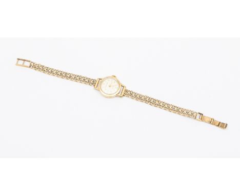 A ladies vintage 9ct gold Ernest Borel (Mappin) wrist watch, comprising a round signed silvered dial with applied gilt arrow 