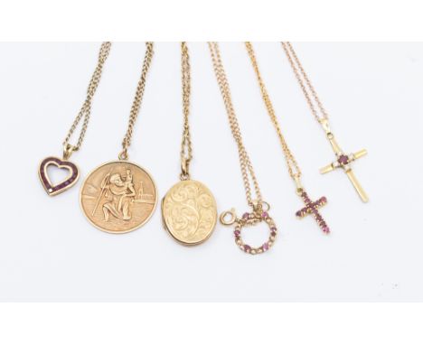 A collection of 9ct gold pendants to include a ruby set circular pendant, width approx 13mm, ruby set cross, length approx 20