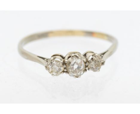 A diamond and platinum three stone ring, comprising graduiated old European cut diamonds, total diamond weight approx 0.55ct,