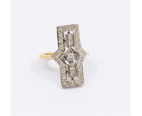 A diamond and 18ct gold Art Deo style dress ring, diamond set, the central principal  diamond approx 0.10ct, within a geometr