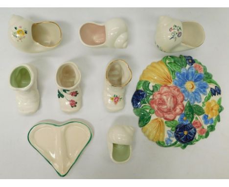 A small collection of Plichta, to include; four shells, three boots, a heart shaped tray with green lined border and a circul