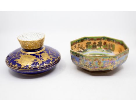 A Crown Devon Fieldings lustrine octagonal chinoiseries decorated bowl with gilt and painted detail, marked underneath. Along
