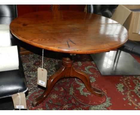 A George III oak tilt-top tea table on tripod base, cut-down. 