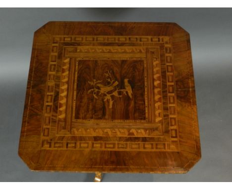 A 19th cenutry North Italian figured walnut occasional table, having a square chamfered top centered with marquetry songbirds