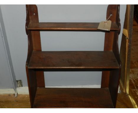  A late Victorian walnut hanging shelf bracket. H.61cm W.47cm