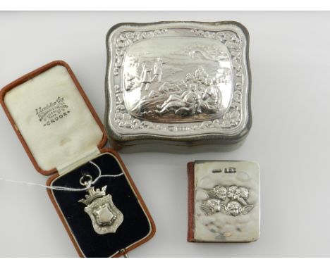 A silver mounted brown hide leather trinket box, together with a silver cartouche metal, and together with a silver mounted m