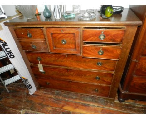 A late Victorian Scottish mahogany chest, fitted an arrangement of seven drawers, raised on bracket feet. H.113cm W.126cm