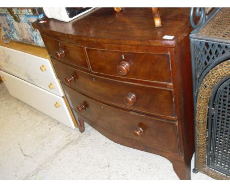 A Victorian mahogany bow fronted chest of two short over two long drawers on bracket feet