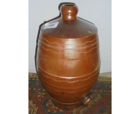 A bronze mortar and stoneware flask