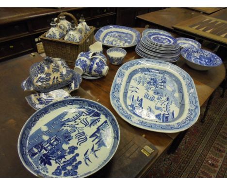 A set of four Victorian blue and white liquor flagons, initialled, in cane carry basket, Copelands' Spode "Italian" pattern b