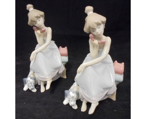 A Lladro figure of a girl on the telephone, a dalmation laid at her feet, impressed mark "5466" (2) to base, together with a 