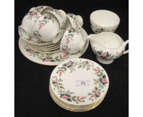 A Wedgwood "Hathaway Rose" six plate part tea service, together with two glass candlesticks, glass oil lamp base converted to