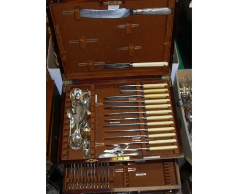 An Elkington and Co Ltd part cutlery canteen comprising ten table knives, twelve table forks, twelve dessert spoons, six egg 