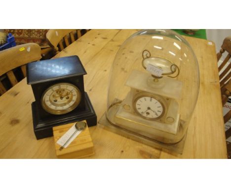 A Victorian black slate and malachite mantle cased clock with visible escapement, the eight- day movement inscribed "John Bul