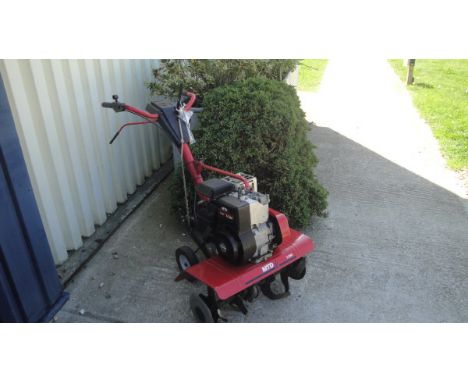 An MTD T/380 petrol rotovator with a 5-horse power Briggs and Stratton engine