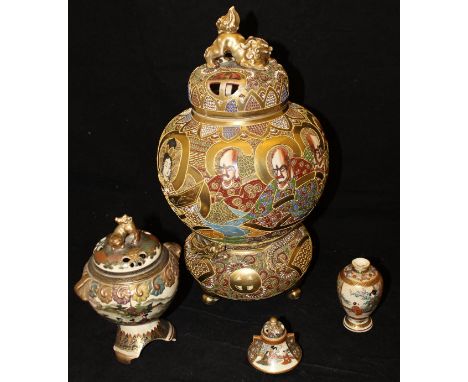 A Japanese Meiji period satsuma ware koro on tripod base, a smaller bell shaped vase and cover, a small baluster shaped vase 