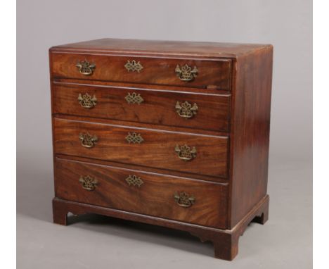 A George II mahogany caddy top chest of small proportions. With crossbanded top, four graduated drawers and raised on bracket