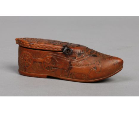 A 17th century Continental treen snuff box formed as a clog. Decorated with a coat of arms and coaching scenes, 12cm.Conditio
