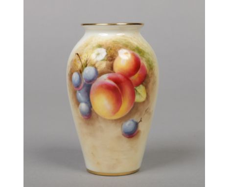 A Royal Worcester specimen vase by Roberts. Painted with peaches and grapes in a vignette. Signed, printed black mark, date c