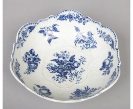 An uncommon marked Caughley large salad bowl. With scalloped rim, moulded with shells and printed in underglaze blue with the