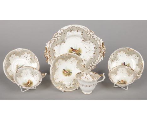 A quantity of Rockingham ornithological tea and coffee wares of Neo Rococo three spur type. With gilt and grey borders each p