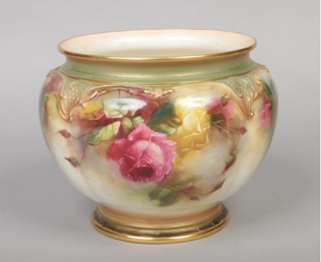 A Royal Worcester jardiniere. Lobed and with moulded border, painted with a continuing band of roses. Printed green mark, dat